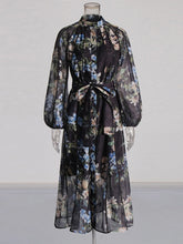 Schwarzes bedrucktes Maxikleid mit Laternenärmeln und Bindeband